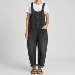 Combinaison femme oversize noir délavé, bretelles larges et poches plaquées
