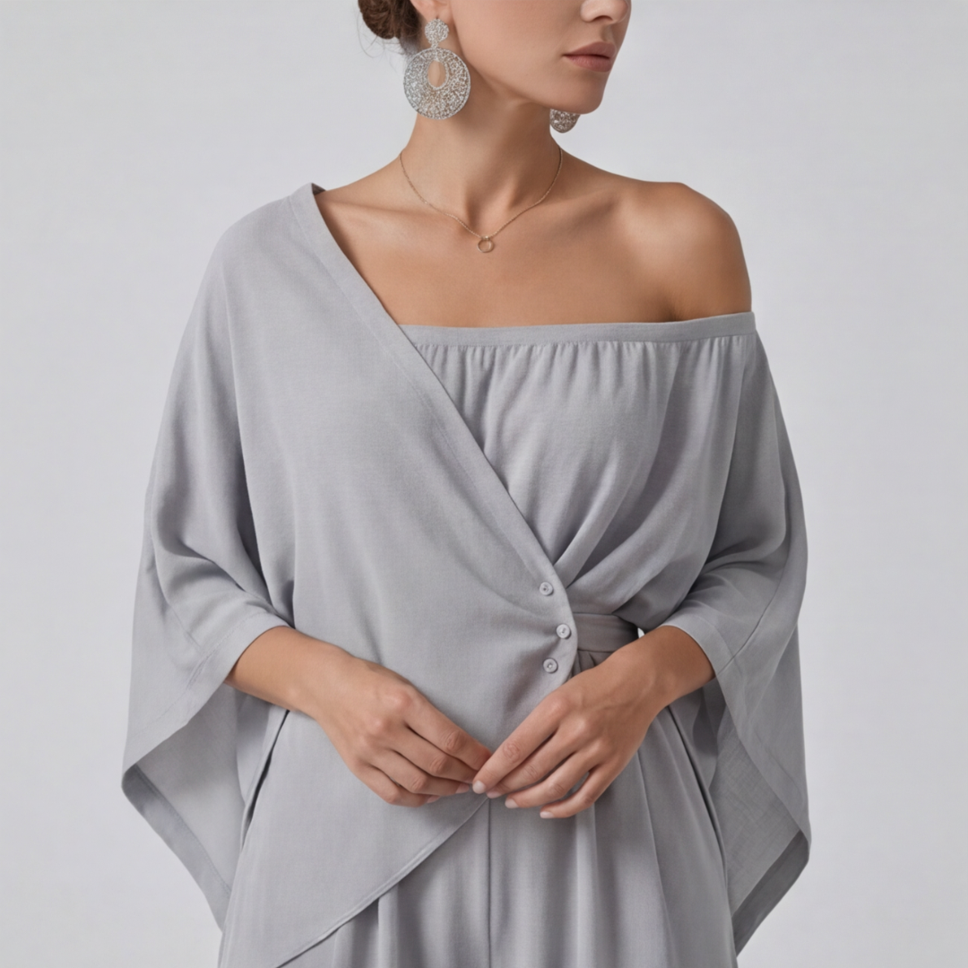Combinaison femme gris nœud central et encolure asymétrique gros plan haut