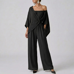 Combinaison femme noir nœud central épaule asymétrique vue entière