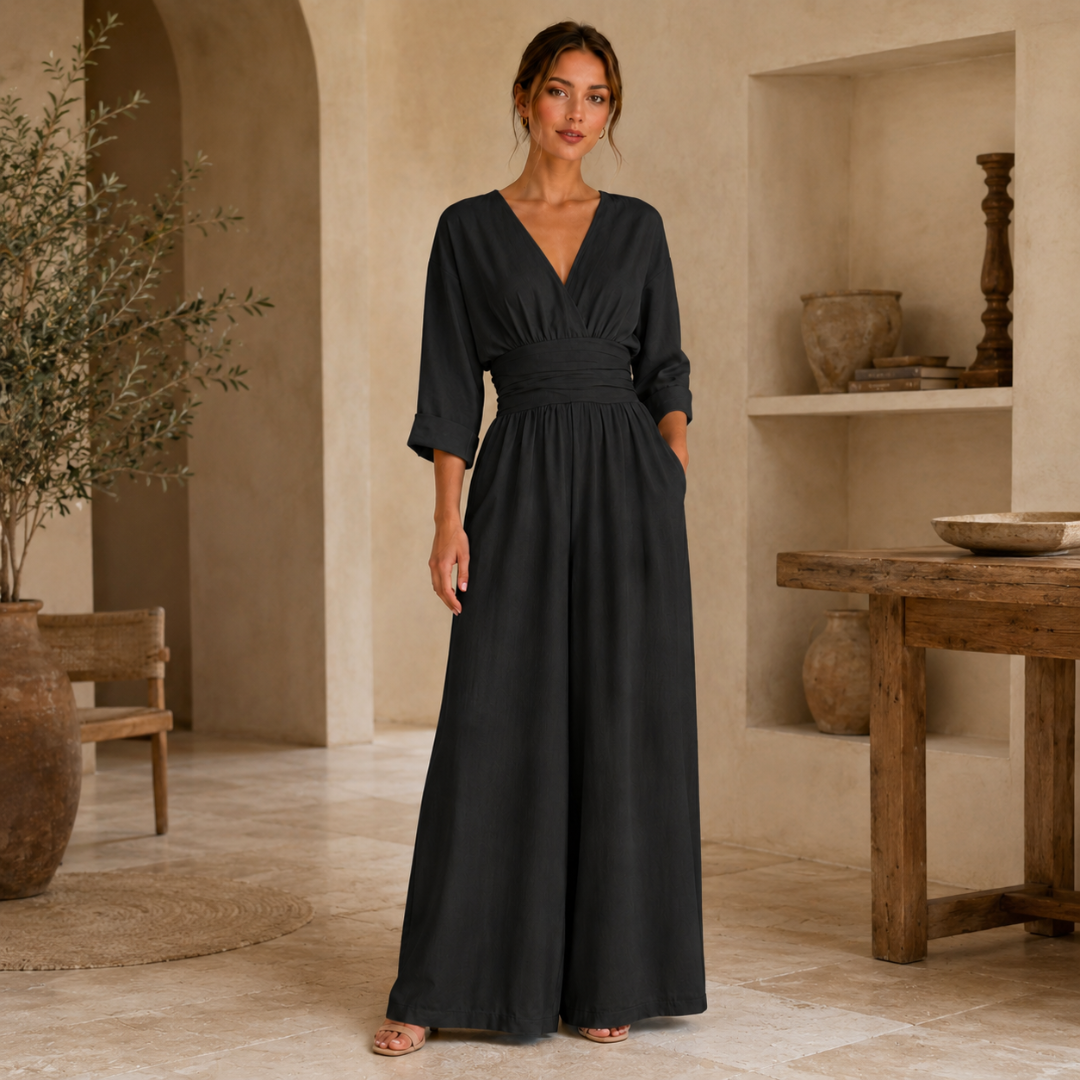 Combinaison longue femme noir col V, jambes larges élégantes, vue de face