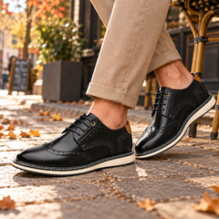 Derbies homme noirs à bout golf perforé et empiècement camel au talon