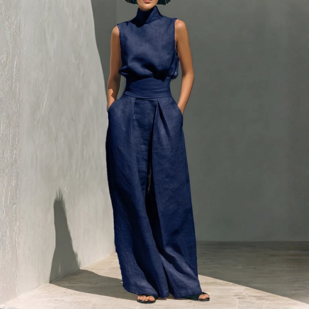 Ensemble deux pièces marine vue de face, top col montant et pantalon large taille haute
