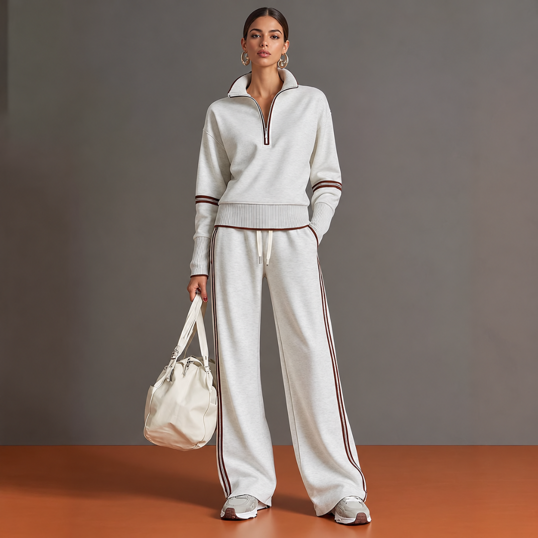 Ensemble femme blanc avec pull demi-zip et pantalon large à bandes contrastantes