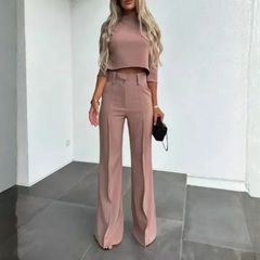 Ensemble femme rose nude vue de dos, pantalon large taille haute et crop top