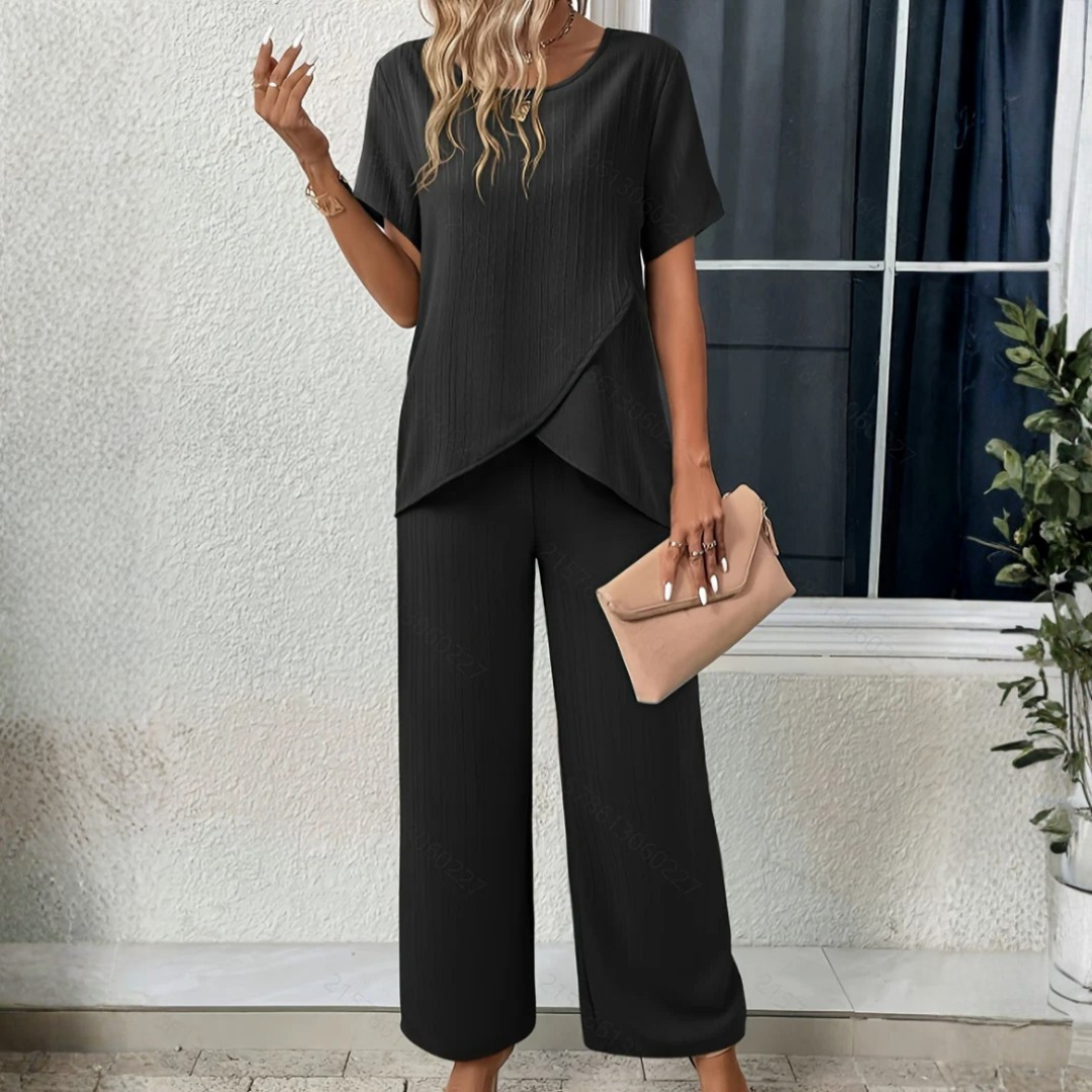 Set coordiné femme coloris noir, détail bas pantalon fluide jambe large