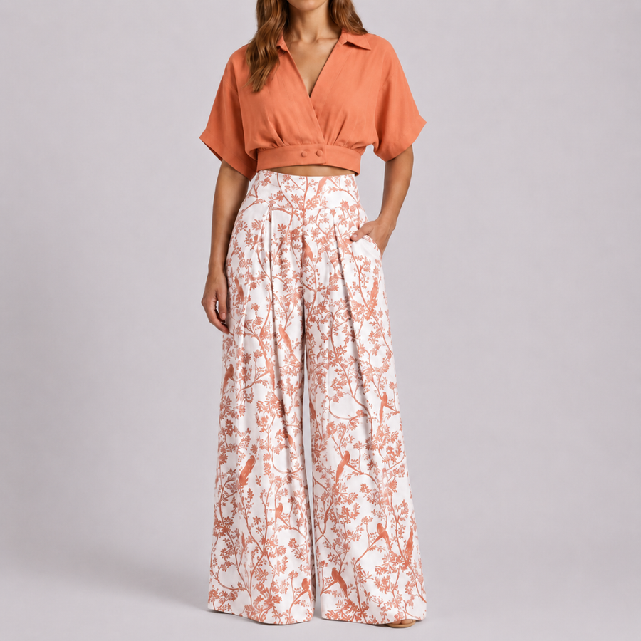 Ensemble deux pièces orange, top court et pantalon large à motif floral et oiseaux