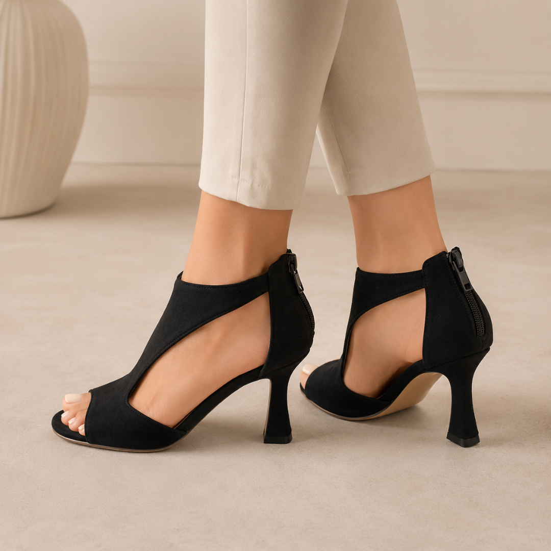 Escarpins noir vus de dos avec fermeture zippée et talon fin