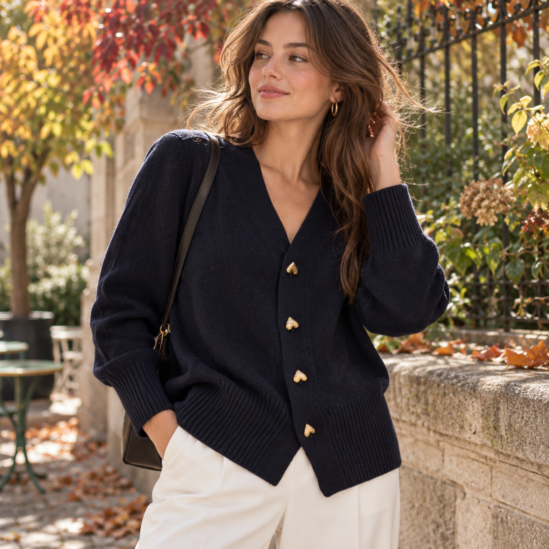 Gilet femme noir à col V, boutons cœurs dorés et poignets larges côtelés