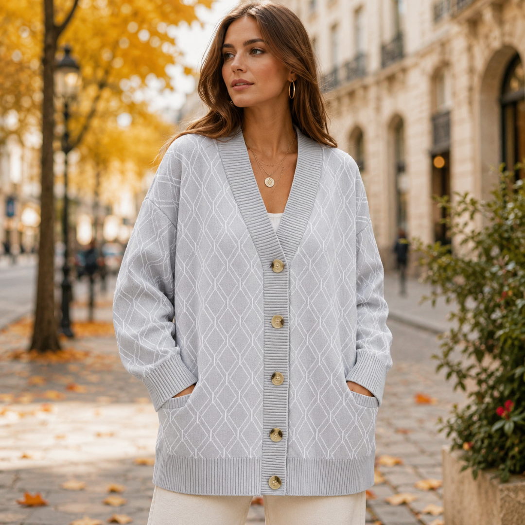Gilet gris clair à motif losanges avec poches devant et poignets côtelés