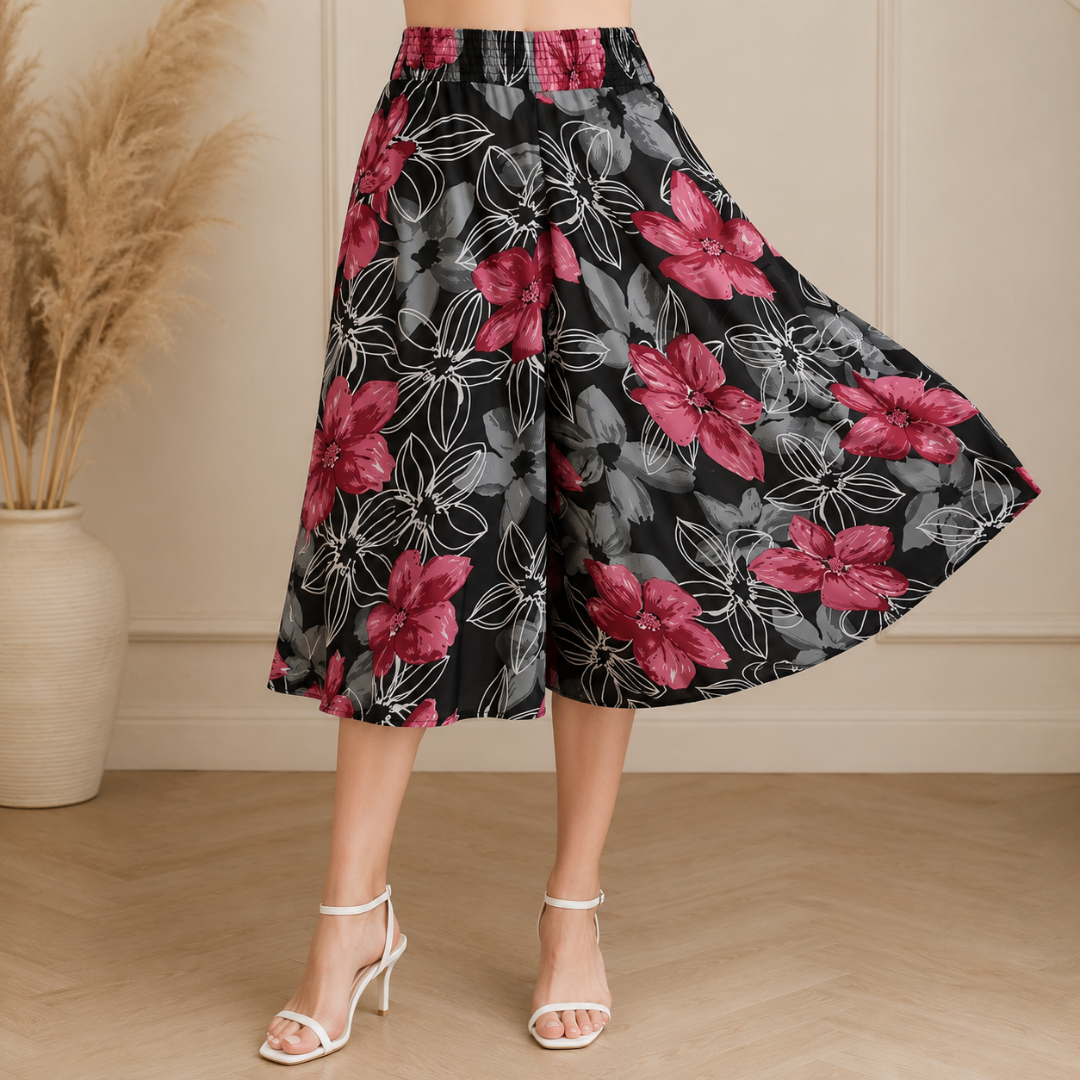 Jupe-culotte noire à grandes fleurs bordeaux et grises, coupe large évasée