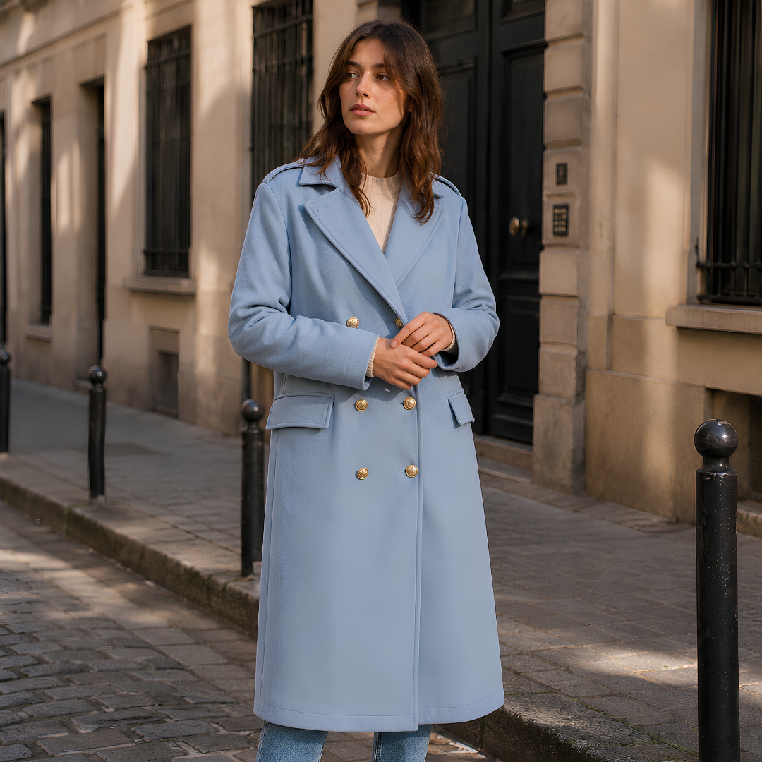 Manteau femme bleu long à revers crantés et double rangée de boutons