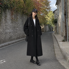 Manteau long femme noir à double boutonnage, revers larges et coupe ample