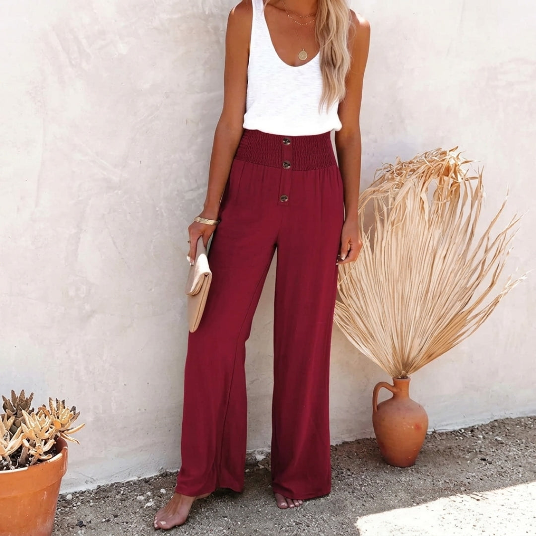 Pantalon fluide femme bordeaux à taille haute avec rangée de boutons en façade