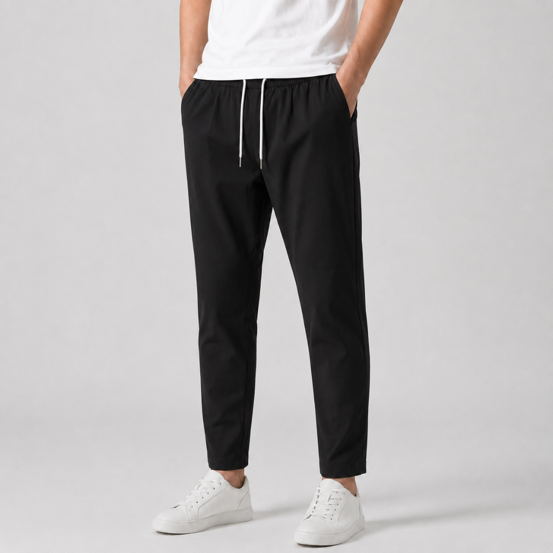 Pantalon homme coupe slim noir avec cordon de serrage blanc contrastant