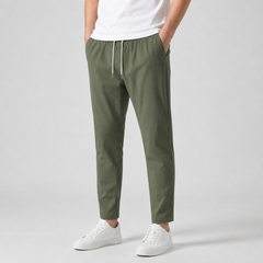 Pantalon homme coupe slim vert avec cordon de serrage blanc et poches