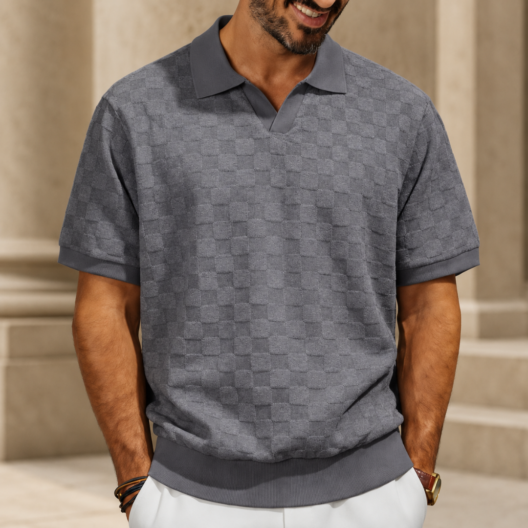 Polo homme gris à motif damier en relief et poignets côtelés
