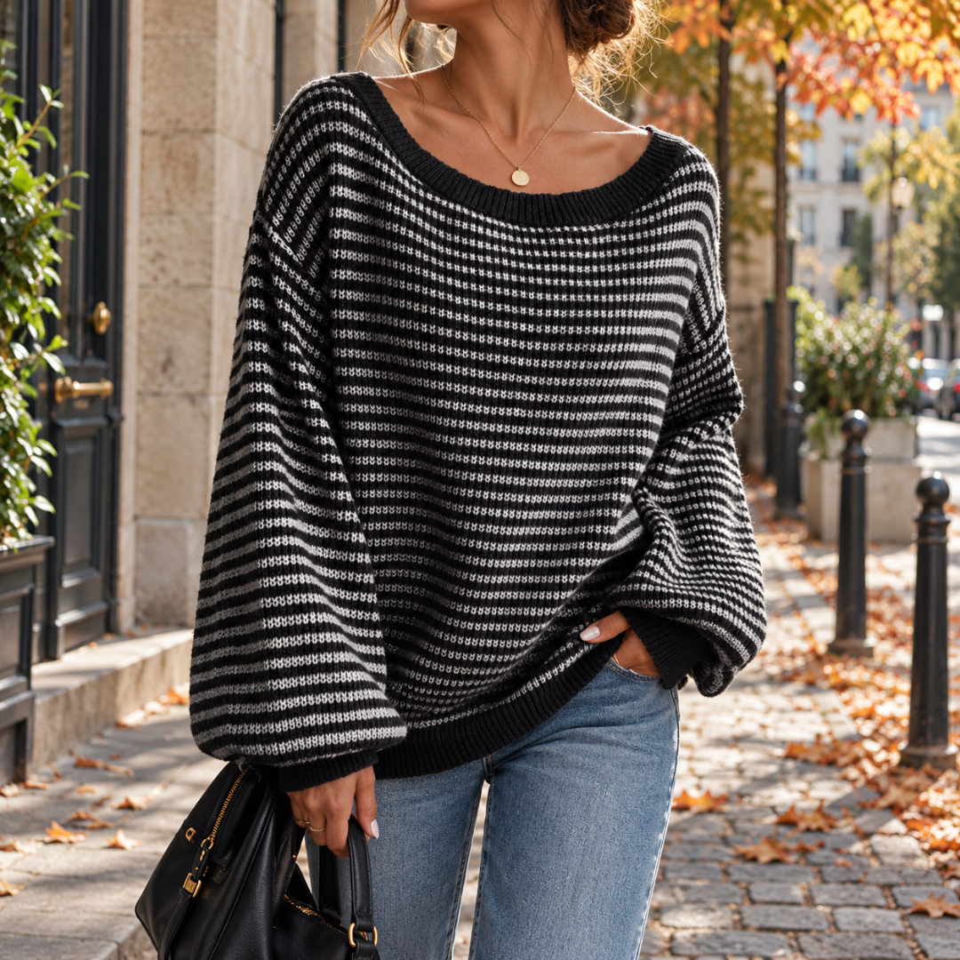 Pull femme noir à rayures blanches, maille texturée et bas côtelé