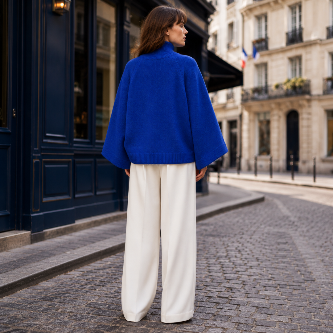 Dos du pull femme bleu, coupe ample et emmanchures raglan bien marquées