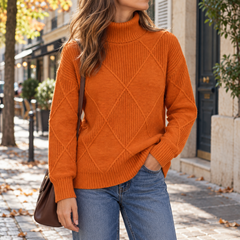 Pull femme orange à col roulé, poignets côtelés et manches longues
