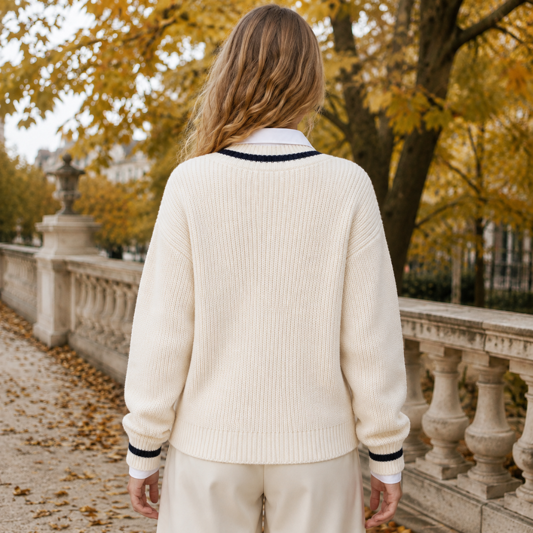 Dos du pull femme beige en maille côtelée avec bordure contrastée à l'encolure