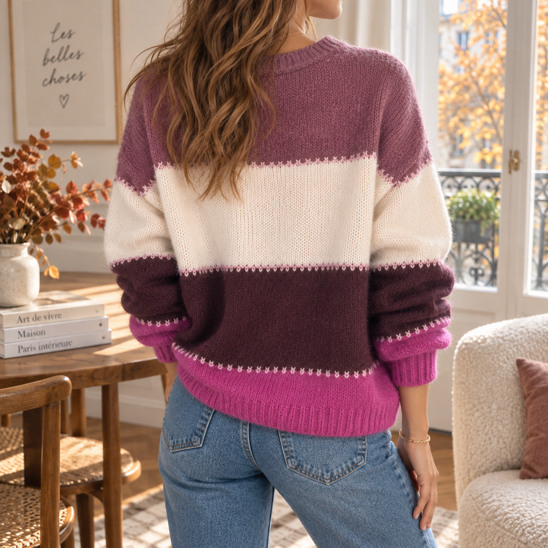 Dos du pull femme rose color block, bas côtelé fuchsia et manches longues