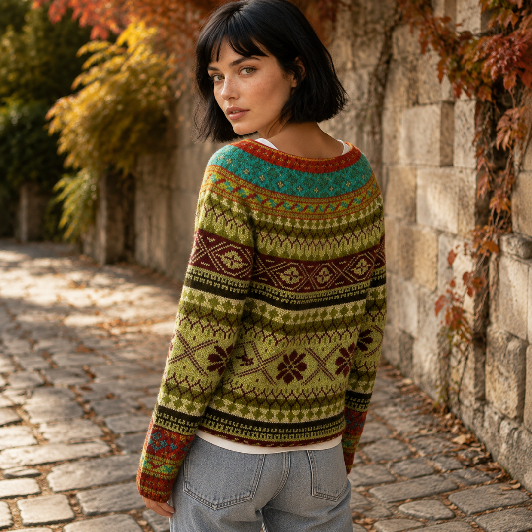 Dos du pull jacquard jaune, empiècement turquoise et frises géométriques contrastées