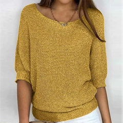 Pull femme jaune moutarde en maille, col bateau dégagé et manches chauve-souris