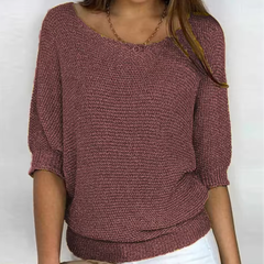 Pull femme marron foncé en maille, encolure bateau et manches chauve-souris