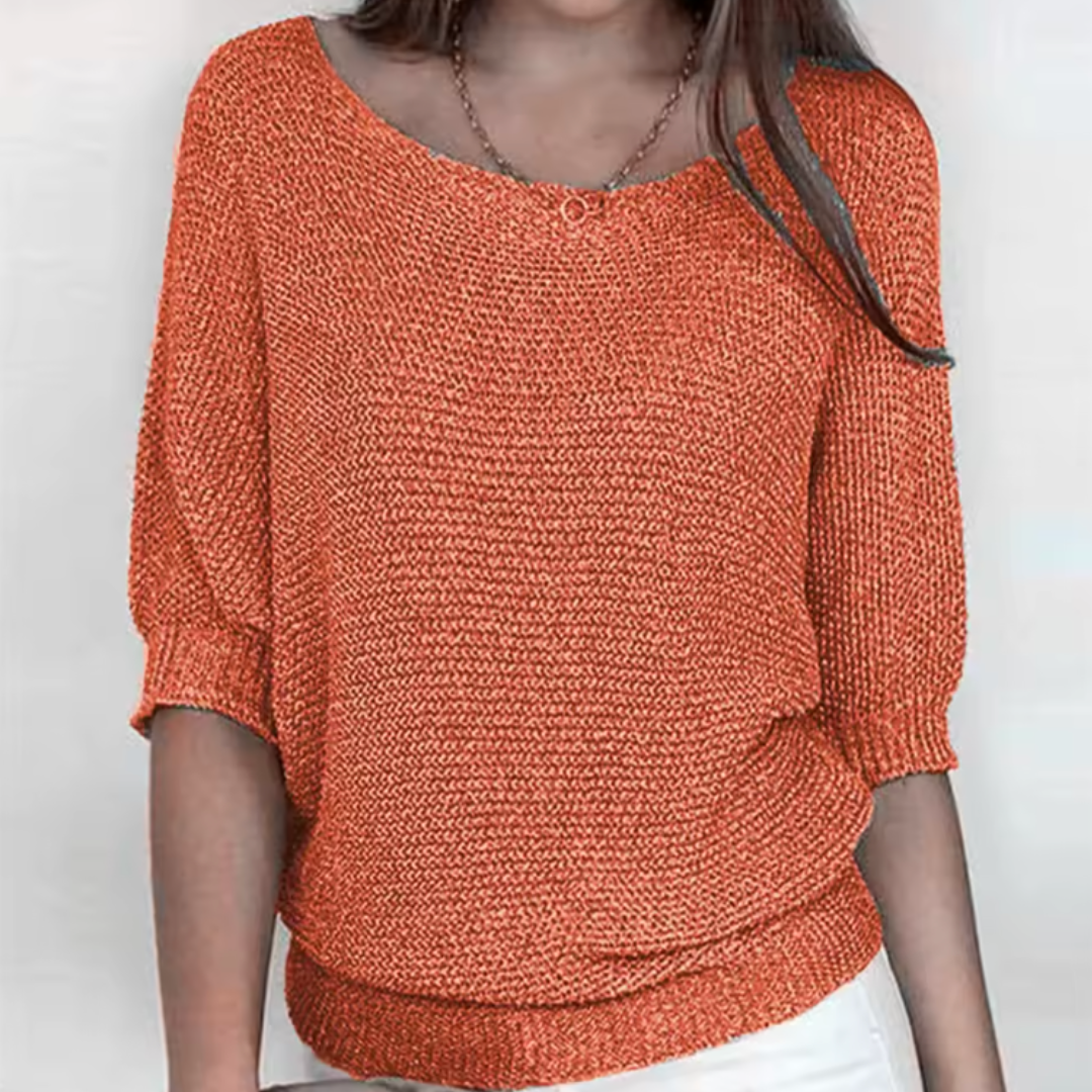 Pull femme orange à col bateau et manches chauve-souris en maille tricotée