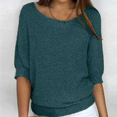Pull femme vert foncé à col bateau dégagé et manches chauve-souris