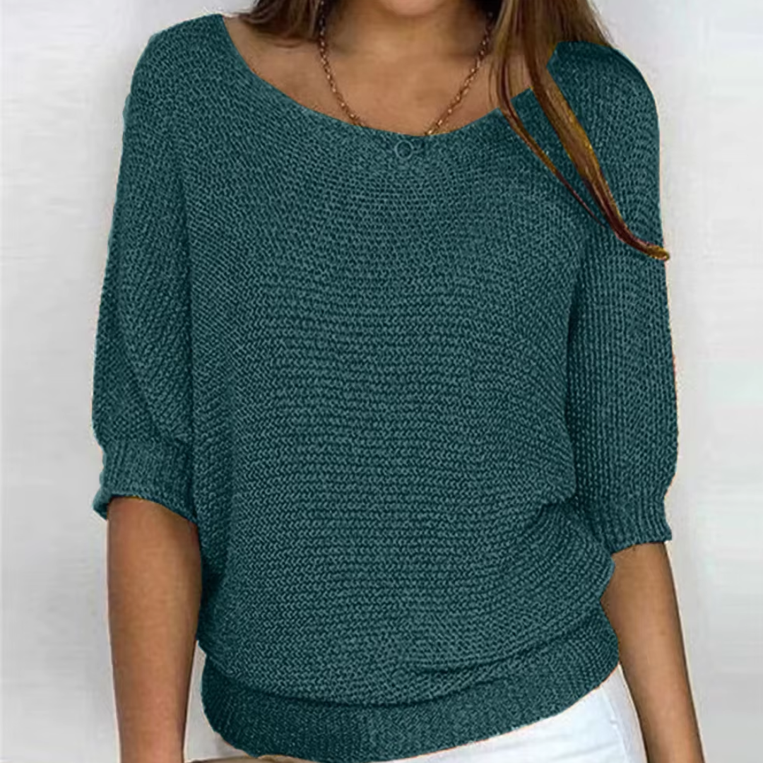 Pull femme vert foncé à col bateau dégagé et manches chauve-souris