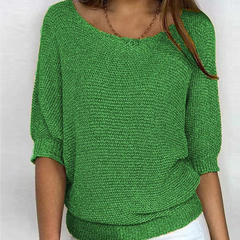 Pull femme vert en maille tricotée, manches chauve-souris et large bas côtelé
