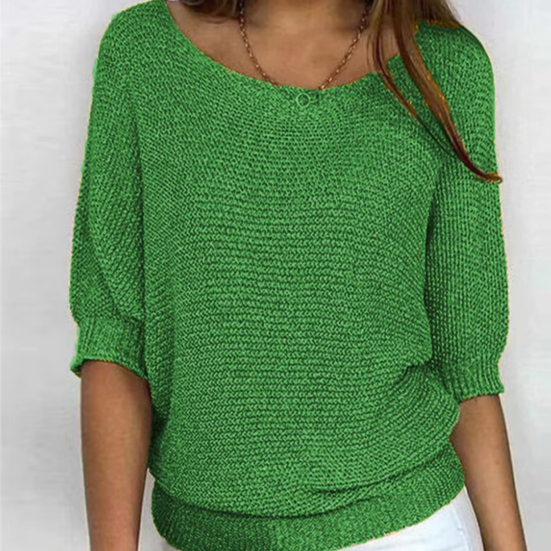 Pull femme vert en maille tricotée, manches chauve-souris et large bas côtelé