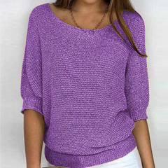 Pull femme violet en maille avec manches chauve-souris et poignets côtelés