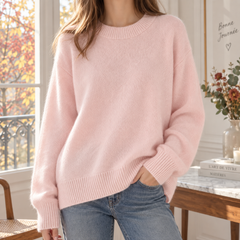 Pull femme rose pâle en maille avec col rond côtelé et base côtelée