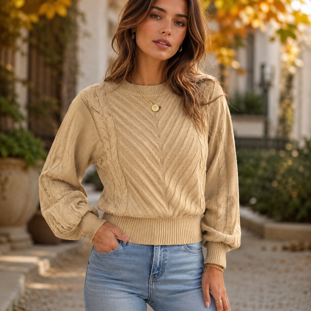 Pull femme beige en maille torsadée à col rond avec bande côtelée à la taille
