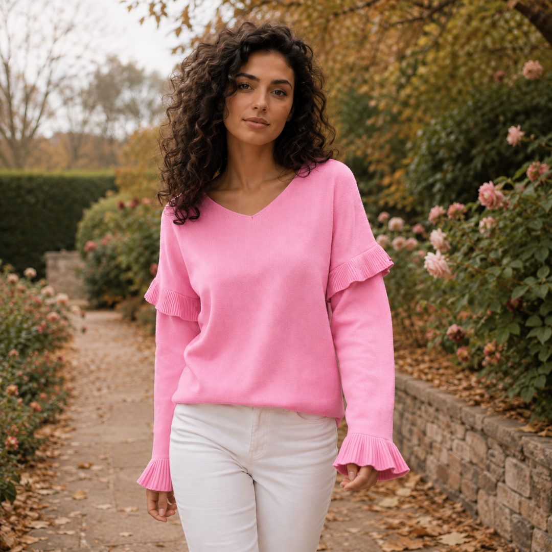 Pull rose à col V avec volant plissé sur l'épaule et poignets en corolle