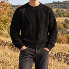 Pull noir côtelé de face, larges bords côtelés aux poignets et à la taille