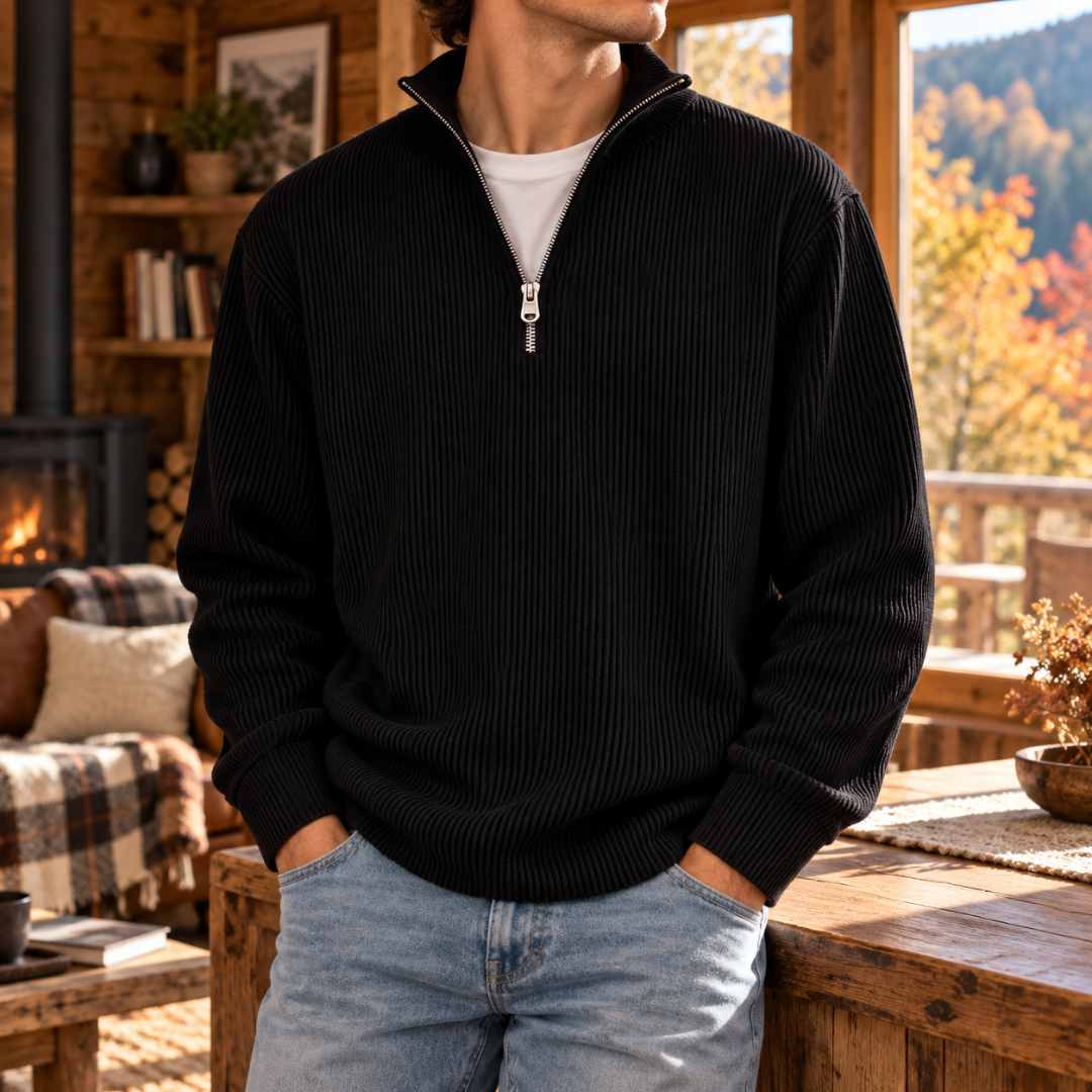 Pull homme noir côtelé avec col montant et fermeture demi-zip contrastée