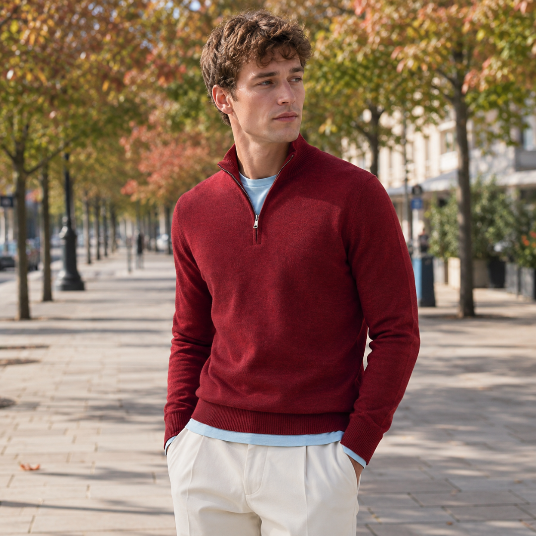 Pull homme rouge à manches longues et poignets côtelés en extérieur ensoleillé