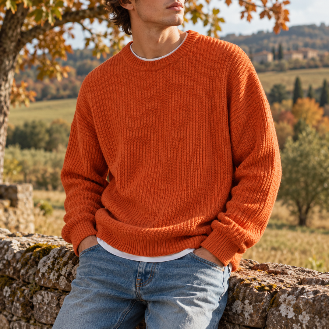 Pull homme orange en maille côtelée à col rond et poignets en bord-côte
