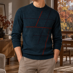 Pull homme bleu nuit orné de lignes rouges graphiques, bords-côtes aux poignets