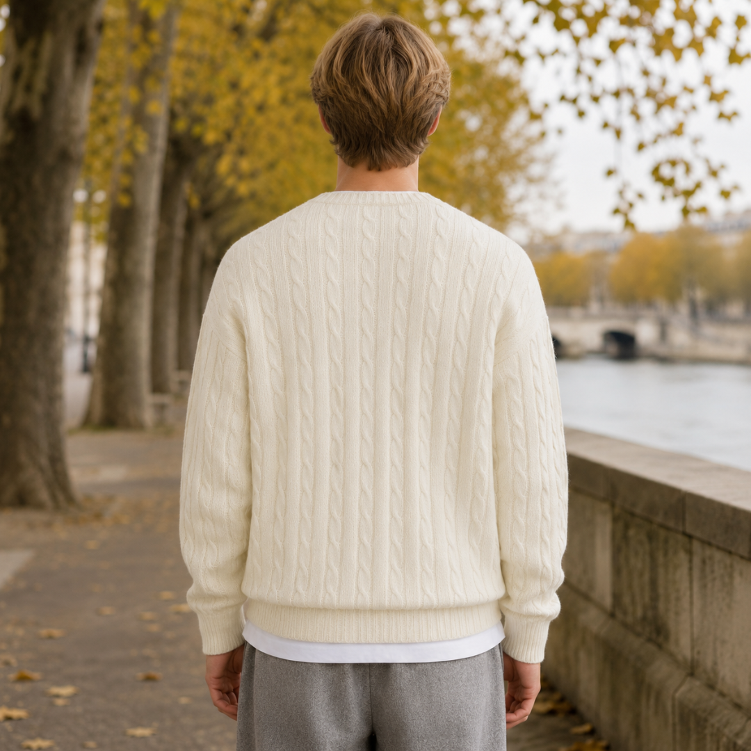 Dos du pull homme blanc à torsades verticales avec bas côtelé