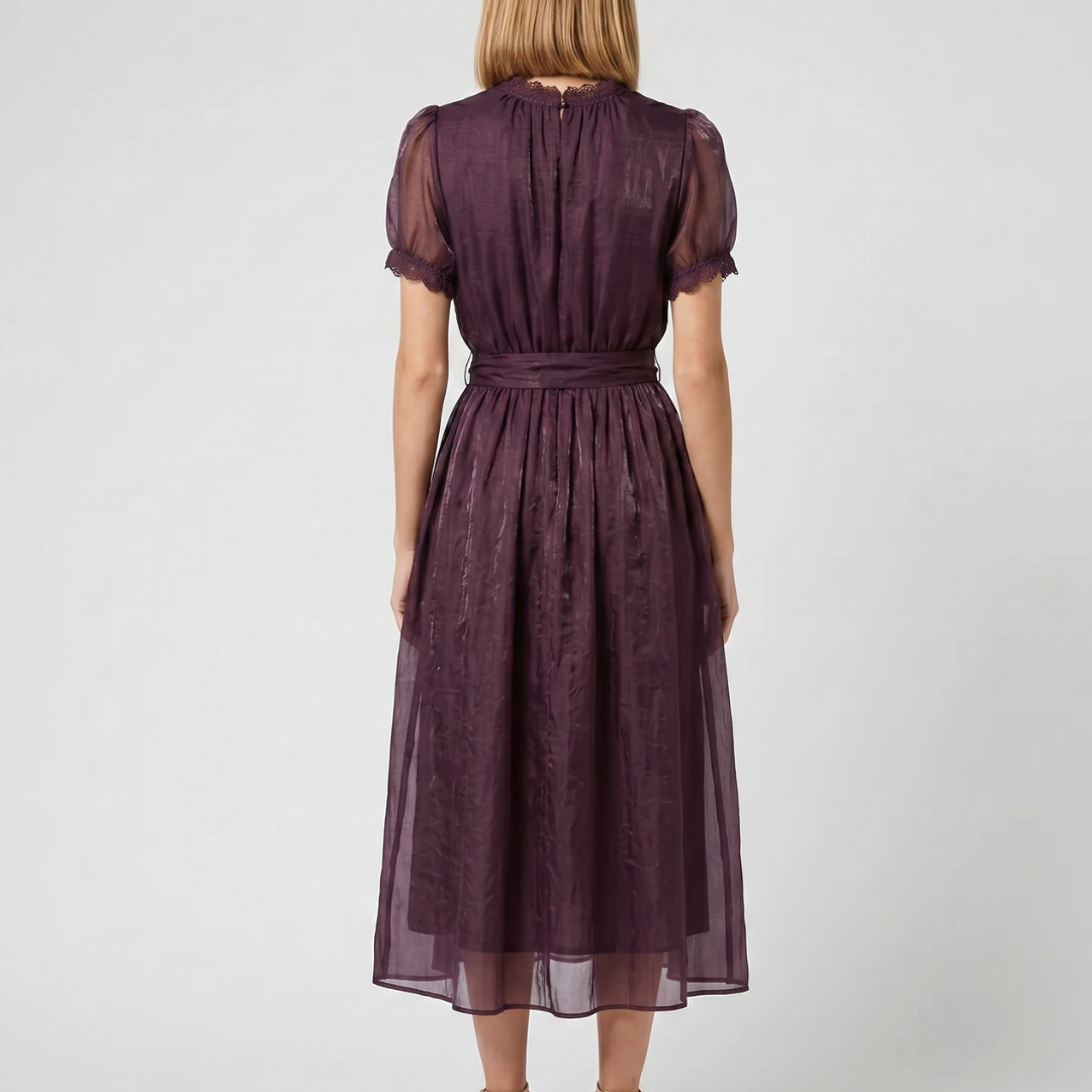 Robe Flavia violette jupe évasée vue de côté tissu brillant