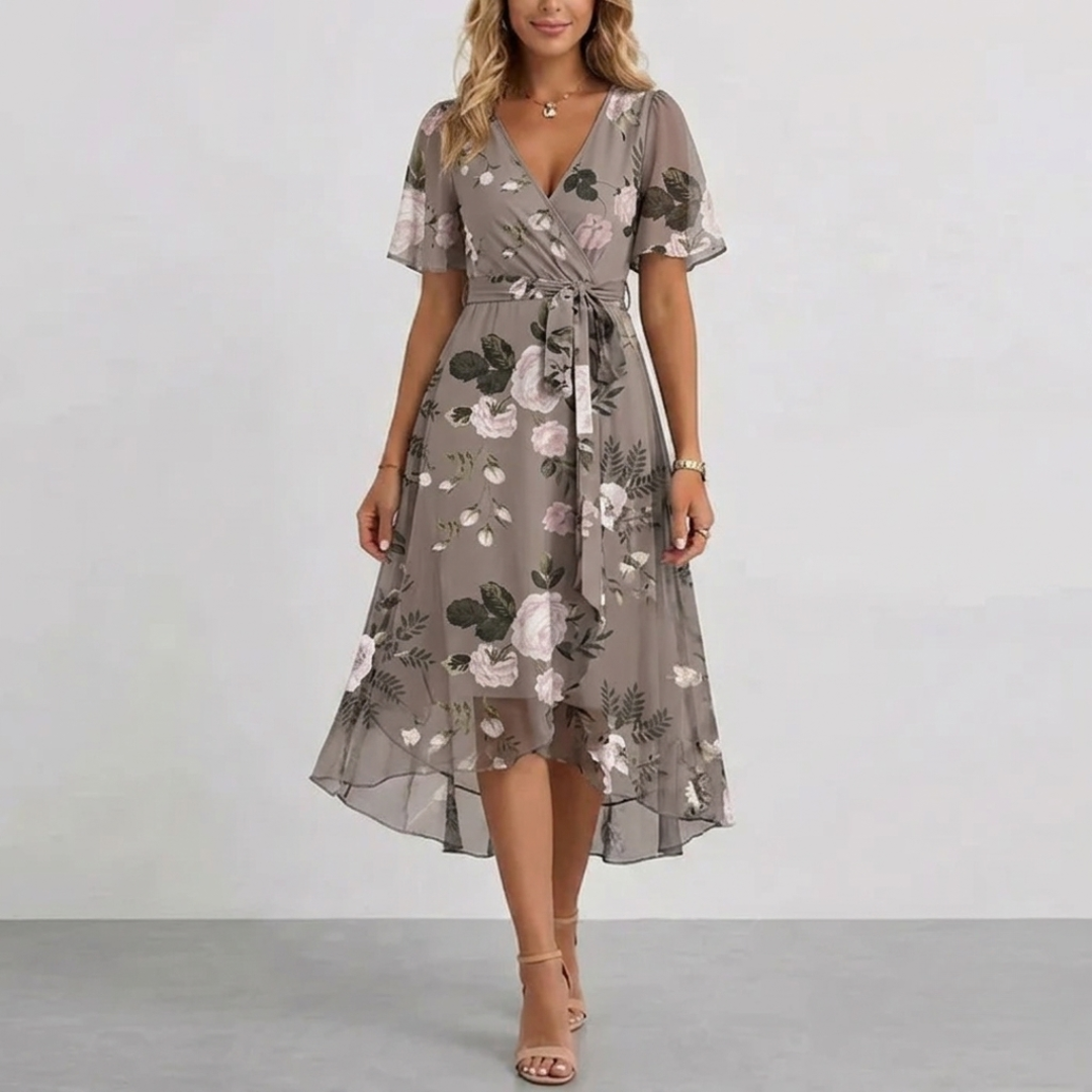 Robe midi beige à imprimé floral discret, coupe fluide et élégante