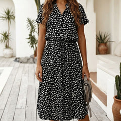 Robe midi noire à imprimé tacheté boutonnée devant avec ceinture nouée à la taille