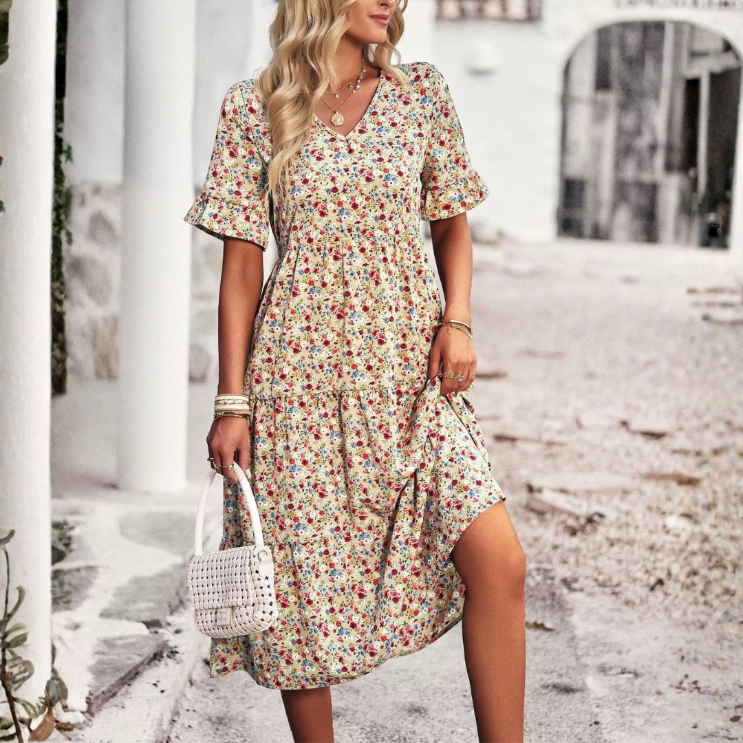 Robe midi col V imprimé fleuri coloris abricot, manches courtes volantées, vue de face