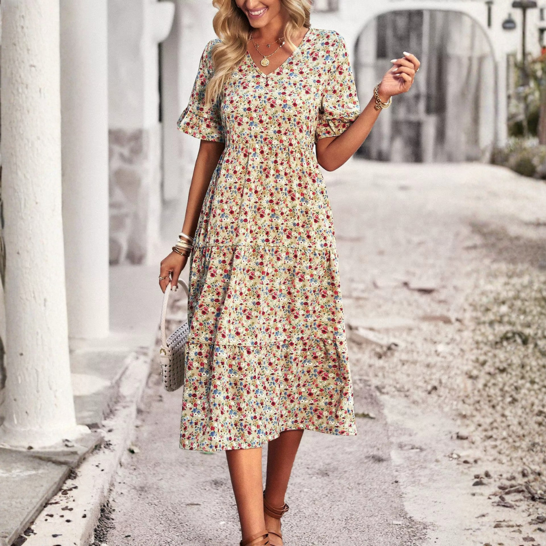 Robe midi bohème abricot à fleurs, silhouette de dos sur fond blanc