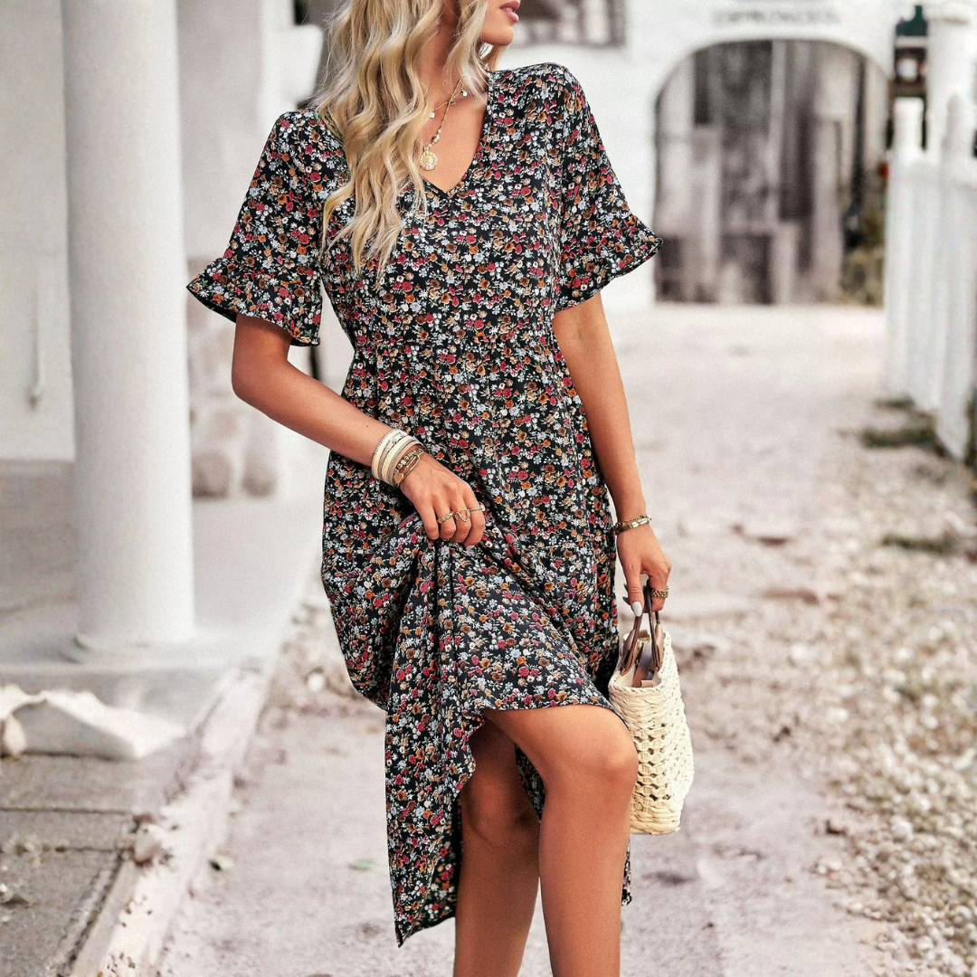 Robe bohème noire à motif floral, vue de dos sur fond blanc