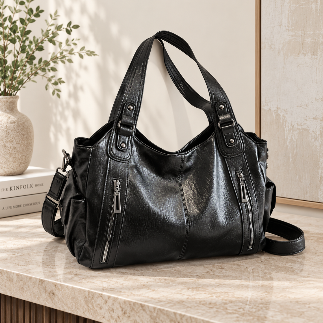 Sac bandoulière femme noir effet cuir avec sangle réglable et poches latérales